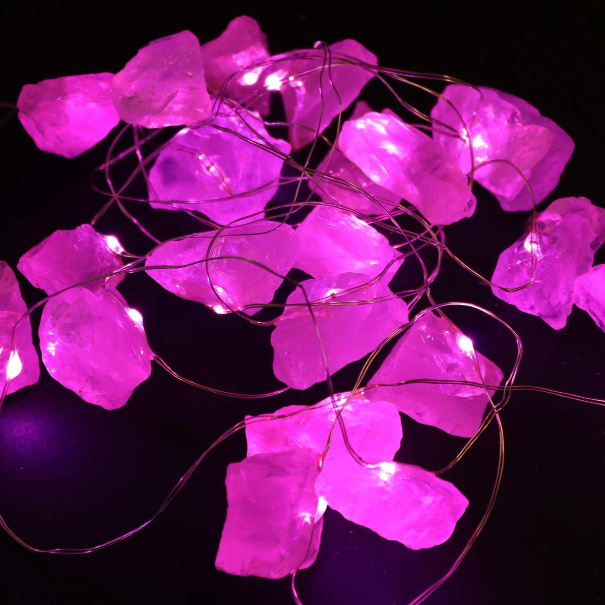 Guirnalda de luces con piedras de cuarzo rosa