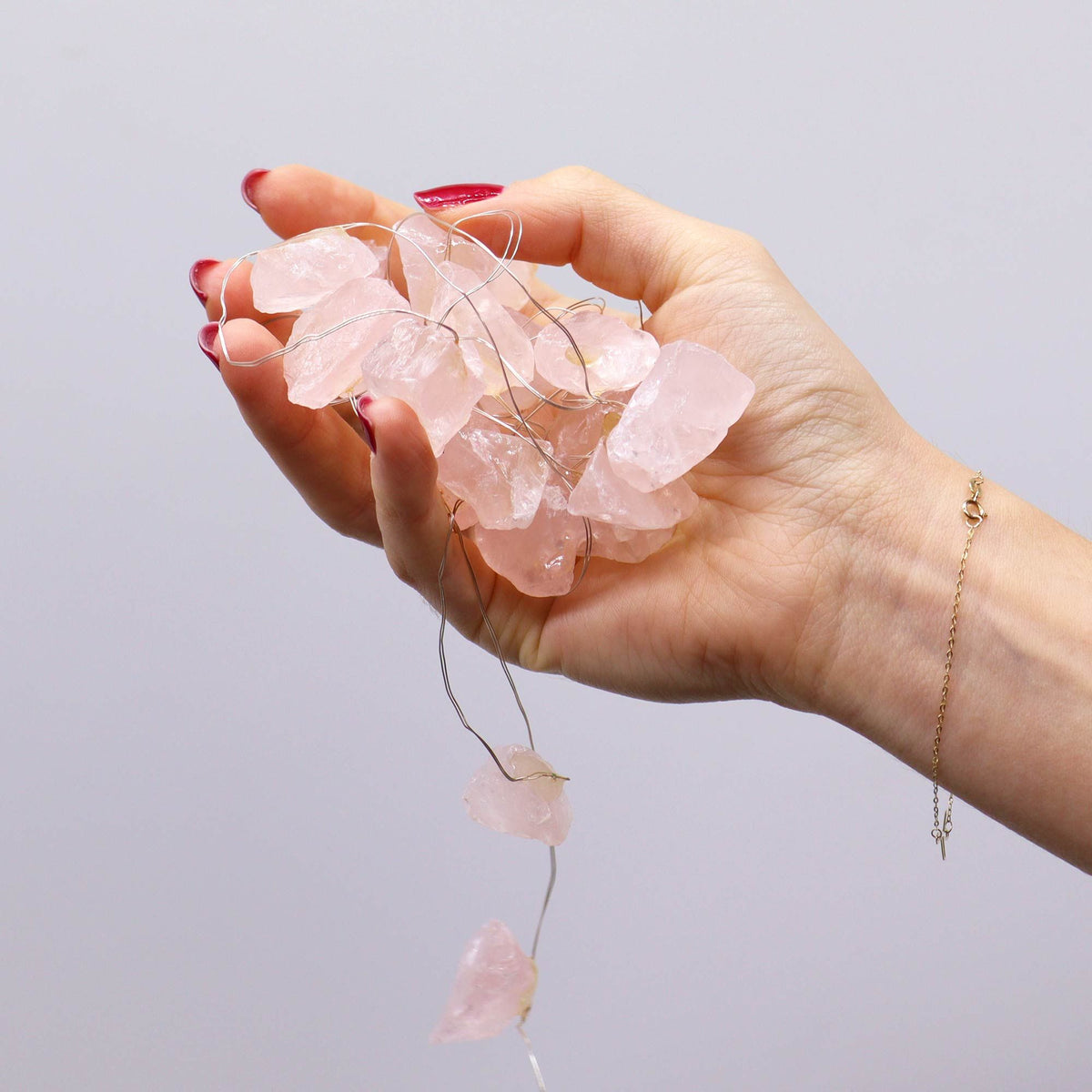 Guirnalda de luces con piedras de cuarzo rosa